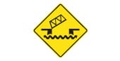 The bridge ahead lifts or swings to let boats pass